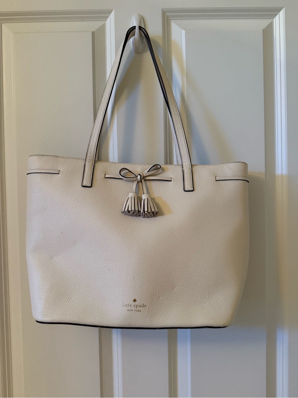 kate spade Cream Hayes with Tassel Accent
